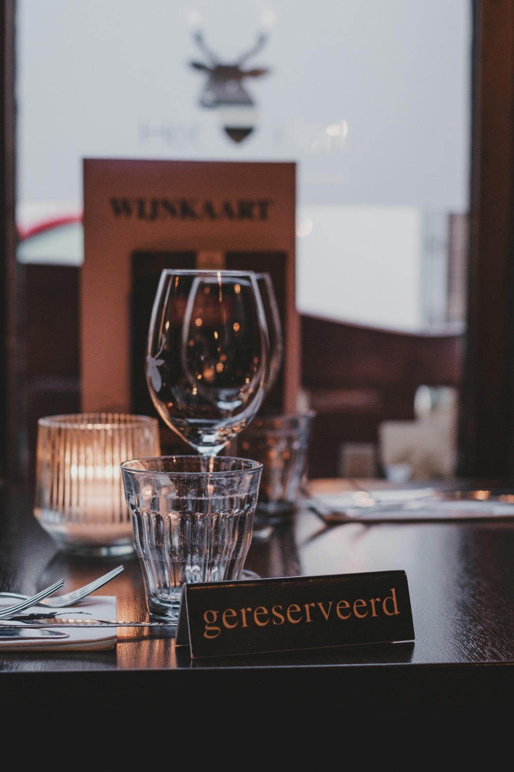 A reserved sign on a restaurant table